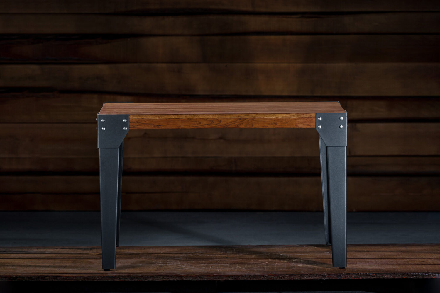 Wooden coffee table with metals legs in the carpenter’s workshop